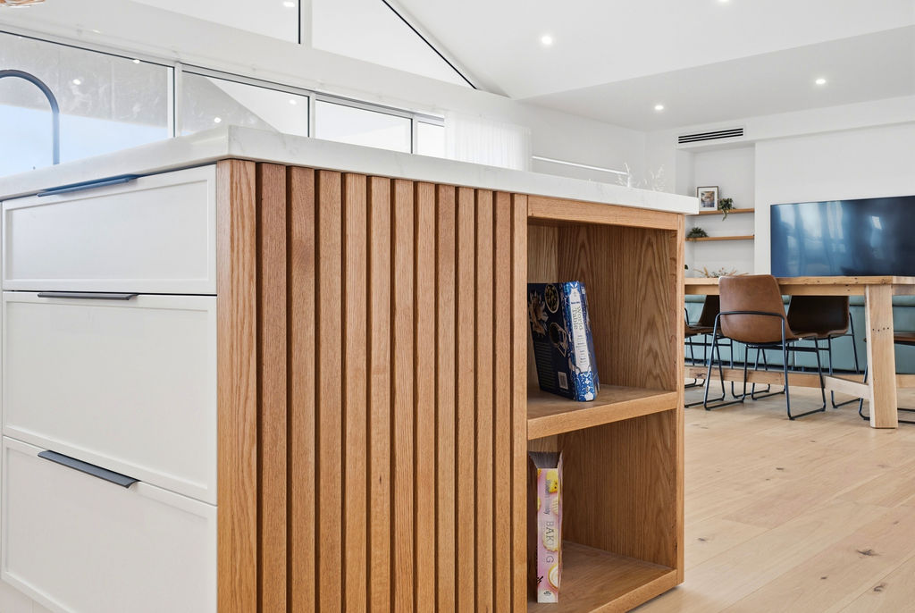 Timber slatted island base with open shelving