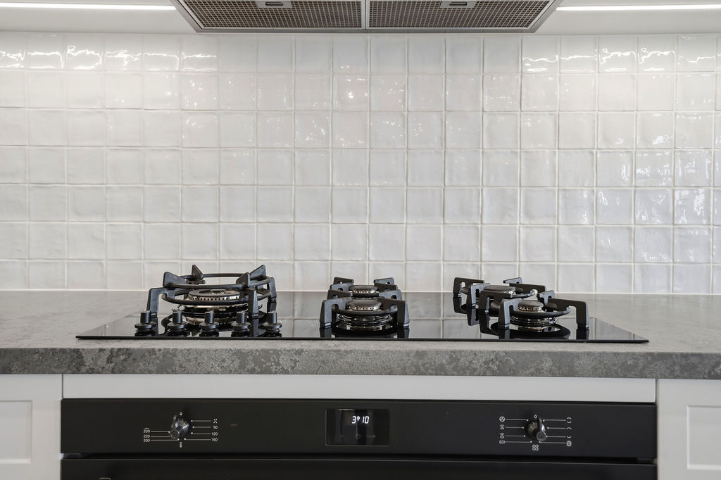 Gas cooktop with zellige tile splashback
